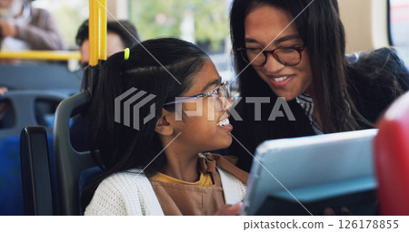 Bus, mother and child with tablet for travel, connection and reading online with conversation for trip. Public transport, mom and girl with technology for streaming app, educational game and commute 126178855