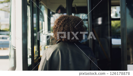Back, bus stop and enter with woman, travel and morning commute with boarding station. Outdoor, city service and passenger with vehicle trip, public transportation and urban town with journey 126178878