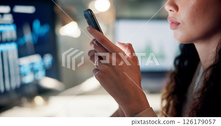Business, night and woman with smartphone, hands and professional with social media. Evening, person and investor in office, cellphone and communication with email, chatting or app for stock market Business, night and woman with smartphone, hands and professional with social media. Evening, person and investor in office, cellphone and communication with email, chatting or app for stock market 126179057