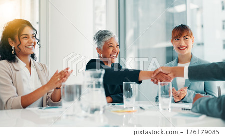 Business people, applause and shaking hands at meeting, celebration or profit goals at finance agency. Man, women and excited with promotion, success and achievement with revenue growth at company Business people, applause and shaking hands at meeting, celebration or profit goals at finance agency. Man, women and excited with promotion, success and achievement with revenue growth at company 126179085