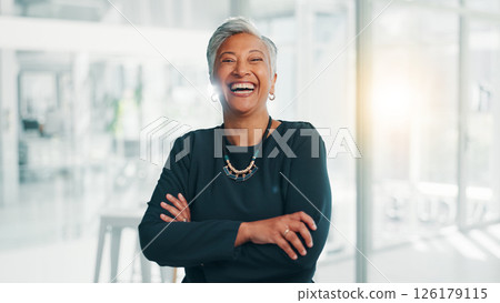 Confidence, business and mature woman laughing in office for investment, venture capital and funny. Professional boss, portrait and happy manager with arms crossed for private equity with experience 126179115