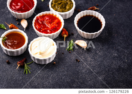 Set of different sauces. Ketchup, mustard, pesto 126179226