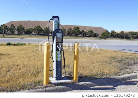 An EVERGY EV Charger outdoor with blue sky  126179278
