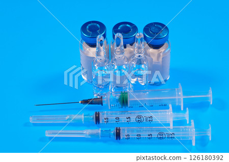 Syringe and ampoules with medicine 126180392