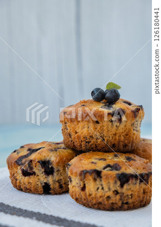 Homemade baked fresh blueberry muffins. Tasty pastry sweet cupcake dessert. Berry pie cupcakes with organic berries. Gluten free healthcare recipe from alternative flour Homemade baked fresh blueberry muffins. Tasty pastry sweet cupcake dessert. Berry pie cupcakes with organic berries. Gluten free healthcare recipe from alternative flour 126180441