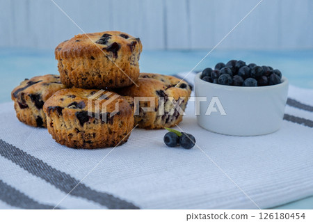 Homemade baked blueberry muffins with fresh blackberries. Tasty pastry sweet cupcake dessert. Berry pie cupcakes with organic berries. Gluten free healthcare recipe from alternative flour Homemade baked blueberry muffins with fresh blackberries. Tasty pastry sweet cupcake dessert. Berry pie cupcakes with organic berries. Gluten free healthcare recipe from alternative flour 126180454