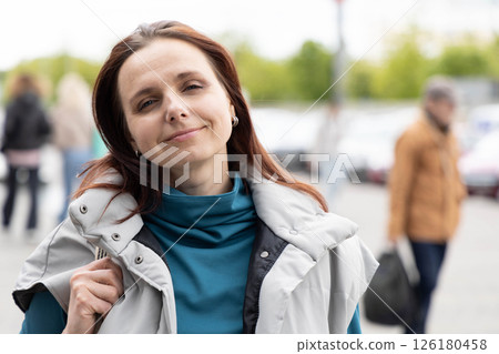 Brunette woman portrait on the street 126180458