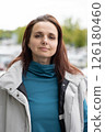 Brunette woman portrait on the street 126180460