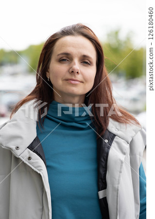 Brunette woman portrait on the street 126180460