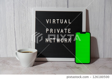 Letter board with text of VIRTUAL PRIVATE NETWORK VPN with mobile phone chroma key green screen mock up template for your copy space app application creation Internet protocols for protection private 126180500