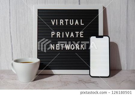 Letter board with text of VIRTUAL PRIVATE NETWORK VPN with mobile phone white screen mock up template for your copy space app application creation Internet protocols for protection private network 126180501