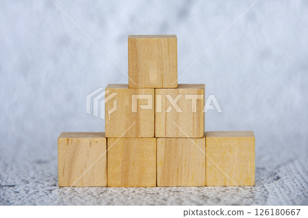 Close up of stacking wooden cubes with customizable space for text Close up of stacking wooden cubes with customizable space for text 126180667