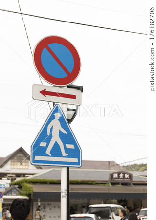 Pedestrian crossing sign, no parking sign, residential area Pedestrian crossing sign, no parking sign, residential area 126182706