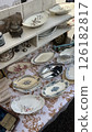 Antique tableware at a flea market 126182817