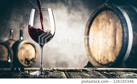 Red wine is poured into the glass in the vineyard. Background concept. Generated Image Red wine is poured into the glass in the vineyard. Background concept. Generated Image 126183346
