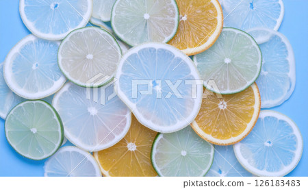 Citrus fruit slices with low light .Background concept. Generated Image Citrus fruit slices with low light .Background concept. Generated Image 126183483