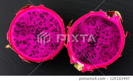 Dragonfruit halved to reveal fractal inside .Background concept. Generated Image 126183497