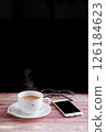 Coffee, smartphone and glasses on the table 126184623
