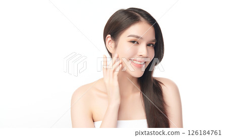 A beautiful young Asian woman with clean, fresh skin against a white background. Skincare, facial treatment, cosmetology, beauty, and spa. An elegant portrait of an Asian woman. A beautiful young Asian woman with clean, fresh skin against a white background. Skincare, facial treatment, cosmetology, beauty, and spa. An elegant portrait of an Asian woman. 126184761