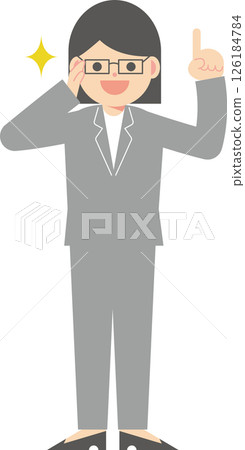 A woman in a suit wearing glasses pointing up A woman in a suit wearing glasses pointing up 126184784