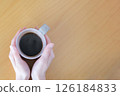 Hand of women who drink coffee 126184833