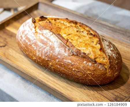 Fresh Sourdough Bread on a Wooden Board 126184909