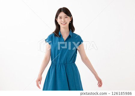 A woman in a dress A woman in a dress 126185986