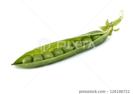 Close-up of an open pea pod revealing multiple, perfectly round green peas on white. 126186722