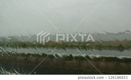 Rainy day bus window 126186831