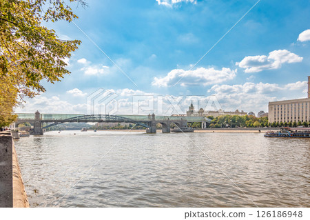 View of the Moscow river embankment, Pushkinsky bridge and cruise ships at sunset. 126186948