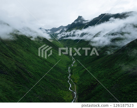 Aerial view of beautiful high altitude grassland mountain canyon landscape Aerial view of beautiful high altitude grassland mountain canyon landscape 126187523