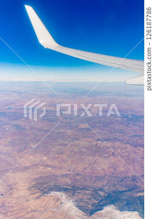 Aerial view on arabian desert and Red sea mountains from airplane Aerial view on arabian desert and Red sea mountains from airplane 126187786