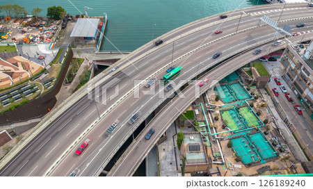 May 11 2025 Aerial View of a City Expressway Overpass and Riverfront May 11 2025 Aerial View of a City Expressway Overpass and Riverfront 126189240