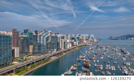 May 11 2025 Modern Urban Cityscape with Elevated Road and Waterfront View 126189270