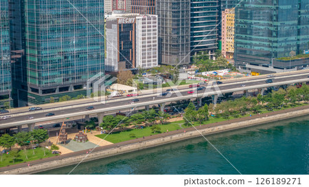 May 11 2025 Modern Urban Cityscape with Elevated Road and Waterfront View 126189271