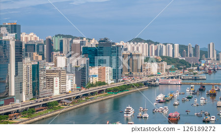 May 11 2025 Modern Urban Cityscape with Elevated Road and Waterfront View 126189272