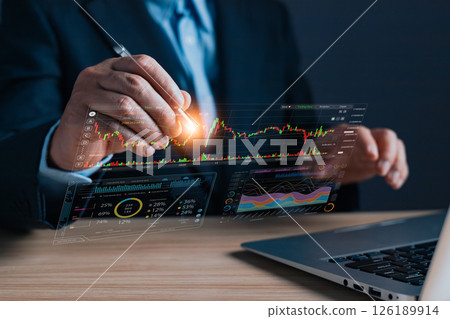 A professional analyzes a digital marketing plan using advanced charts and data graphs on a laptop, showcasing modern strategies, trends, and performance insights for decision making. 126189914