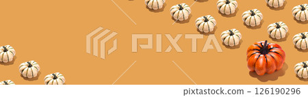Long Horizontal banner with orange and white pumpkin pattern on orange background. Halloween concept copy space place 126190296