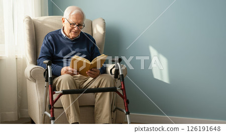 Senior man reads book by walker, home peace fills sunlit room, daily gentle peace 126191648