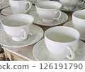 Elegant White Porcelain Teacups and Saucers. 126191790