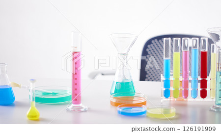 Hands Performing Scientific Experiments in a Modern Laboratory Setting. Hands Performing Scientific Experiments in a Modern Laboratory Setting. 126191909