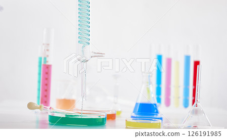 Hands Performing Scientific Experiments in a Modern Laboratory Setting. 126191985