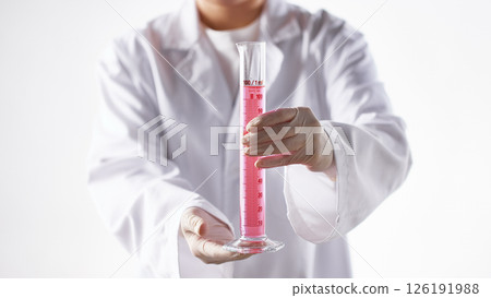 Hands Performing Scientific Experiments in a Modern Laboratory Setting. Hands Performing Scientific Experiments in a Modern Laboratory Setting. 126191988