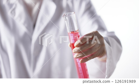 Hands Performing Scientific Experiments in a Modern Laboratory Setting. Hands Performing Scientific Experiments in a Modern Laboratory Setting. 126191989