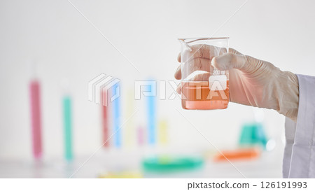 Hands Performing Scientific Experiments in a Modern Laboratory Setting. 126191993