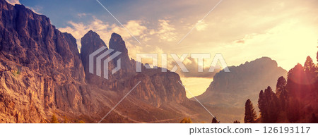 Mountain landscape. Rocks against the sky. The Dolomites in South Tyrol, Gardena Pass, Italy, Europe. Horizontal banner 126193117