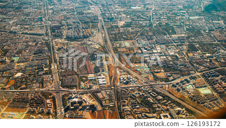 Beijing, China. View From Airplane Window On Multi-story Buildings Of Beijing. Aerial View On Suburb. High-rise Houses Elevated View Cityscape Skyline. Urban Residential Area Overlooks To City. Real Beijing, China. View From Airplane Window On Multi-story Buildings Of Beijing. Aerial View On Suburb. High-rise Houses Elevated View Cityscape Skyline. Urban Residential Area Overlooks To City. Real 126193172