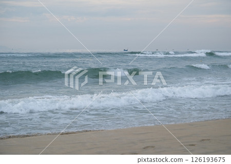 Soft blue ocean wave on sandy beach. Background. 126193675