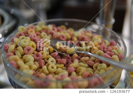 Bowl of Whole Grain Cereal rings isolated on white background Bowl of Whole Grain Cereal rings isolated on white background 126193677