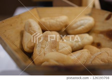 Bread rolls basket little roll breads in basket on table 126193708
